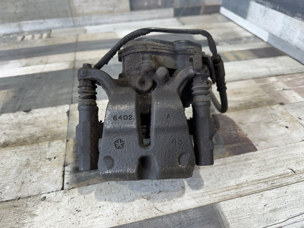Суппорт тормозной задний правый