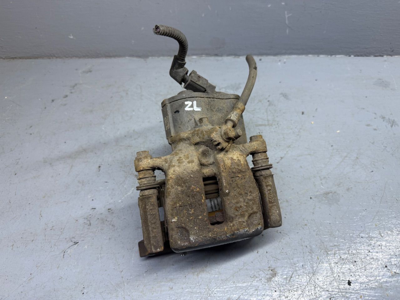 Суппорт тормозной задний левый